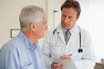 Patient with prostatitis in consultation with a urologist